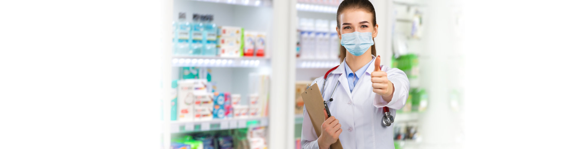 female pharmacist showing thumbs up