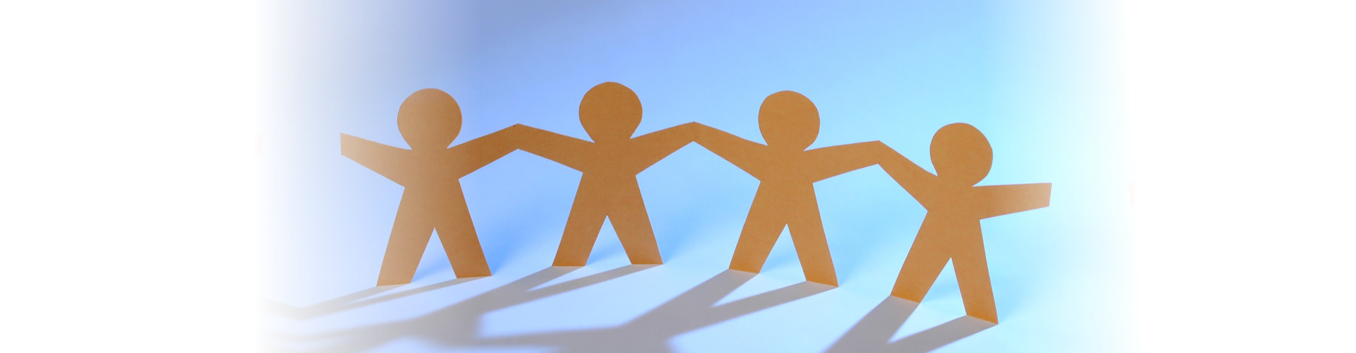 cut-out figures standing together over a blue background